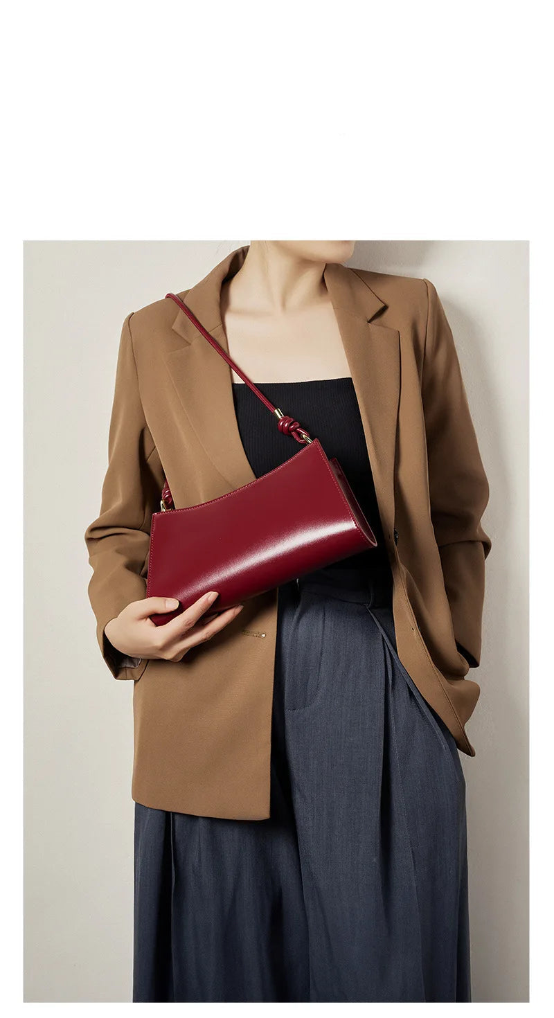 Genuine Leather Handbag with Knotted Strap and Gold Hardware