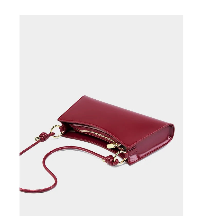 Genuine Leather Handbag with Knotted Strap and Gold Hardware