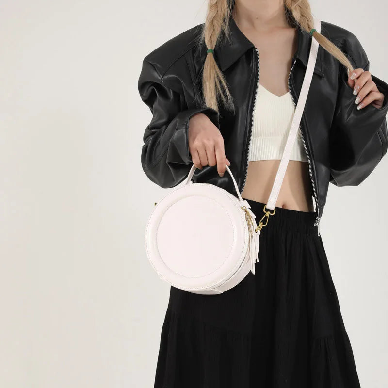 Leather Round Crossbody Bag with Gold Zipper and Adjustable Strap