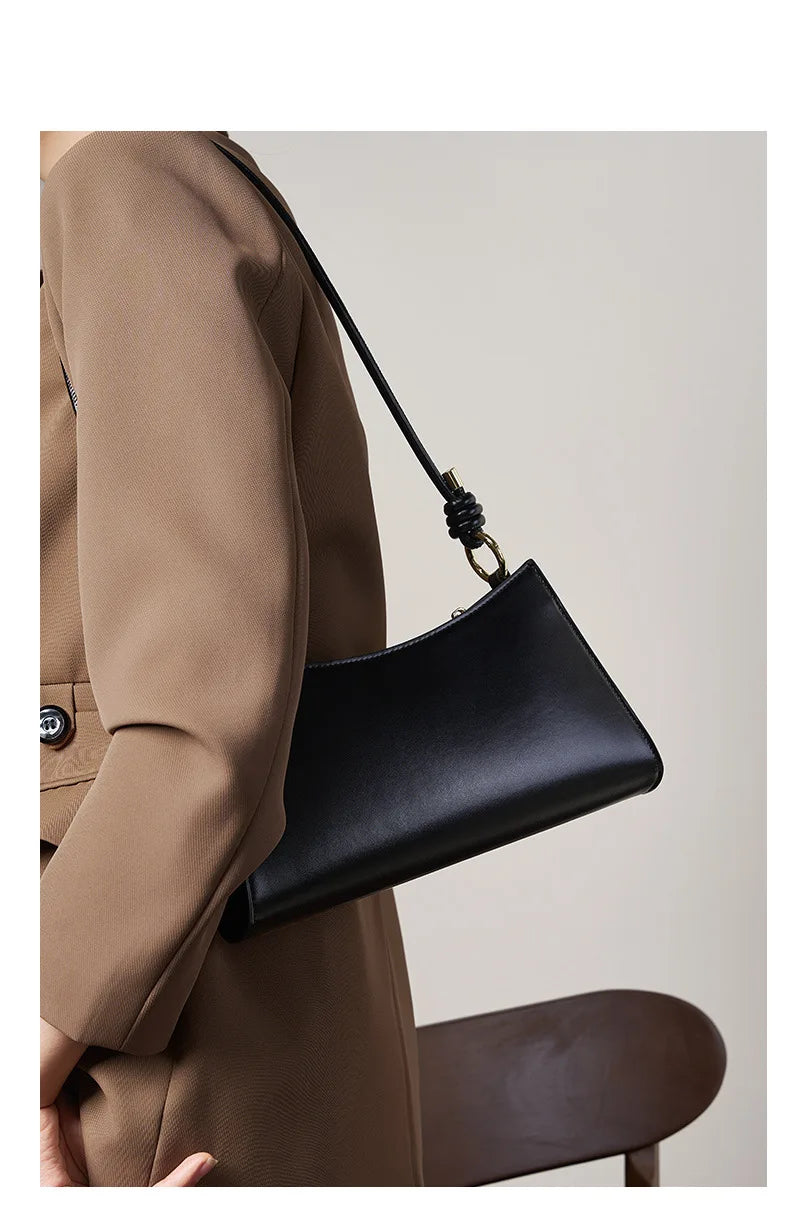 Genuine Leather Handbag with Knotted Strap and Gold Hardware