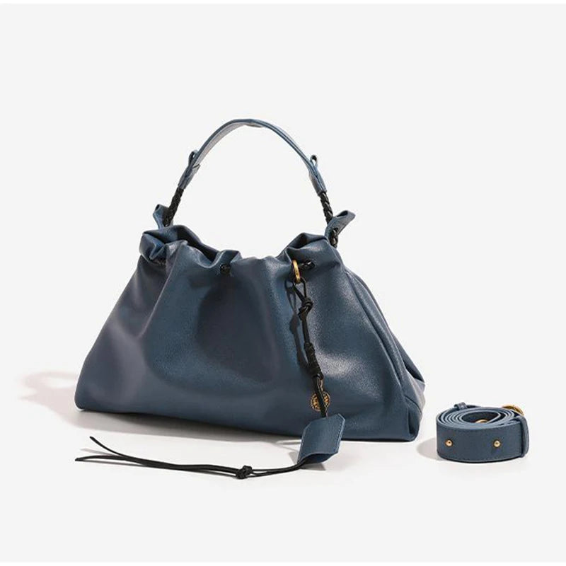 White Leather Bucket Bag with Braided Handle and Adjustable Strap