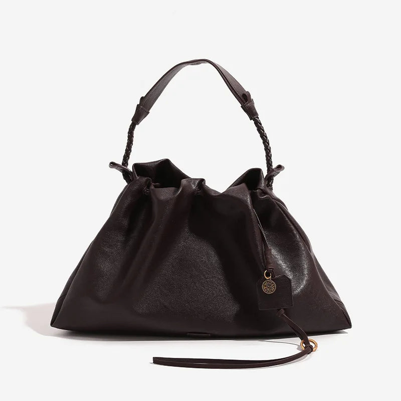 White Leather Bucket Bag with Braided Handle and Adjustable Strap