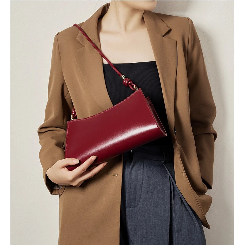 Genuine Leather Handbag with Knotted Strap and Gold Hardware