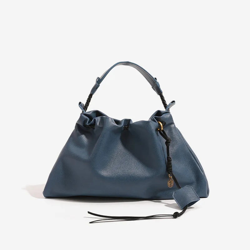 White Leather Bucket Bag with Braided Handle and Adjustable Strap