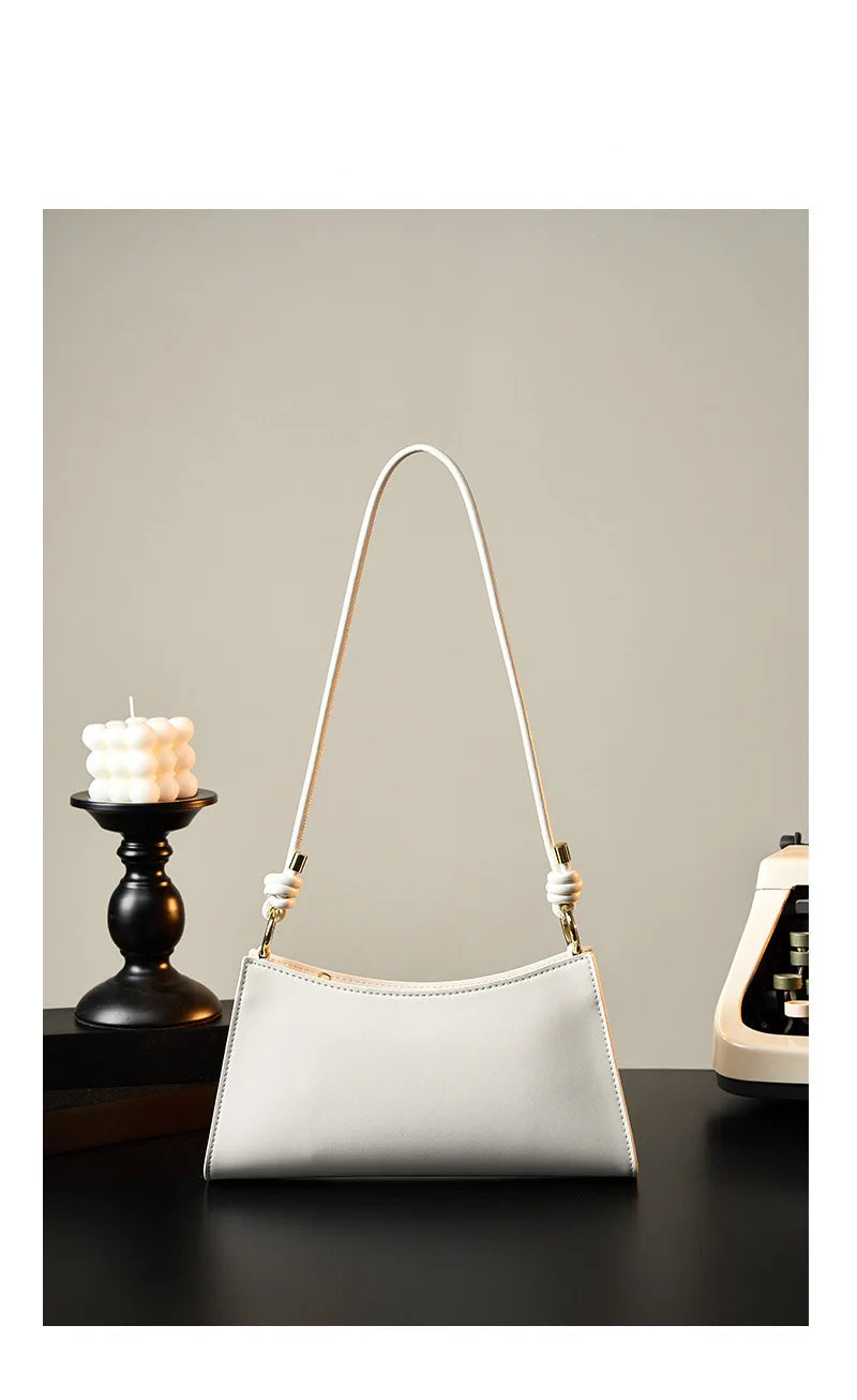 Genuine Leather Handbag with Knotted Strap and Gold Hardware