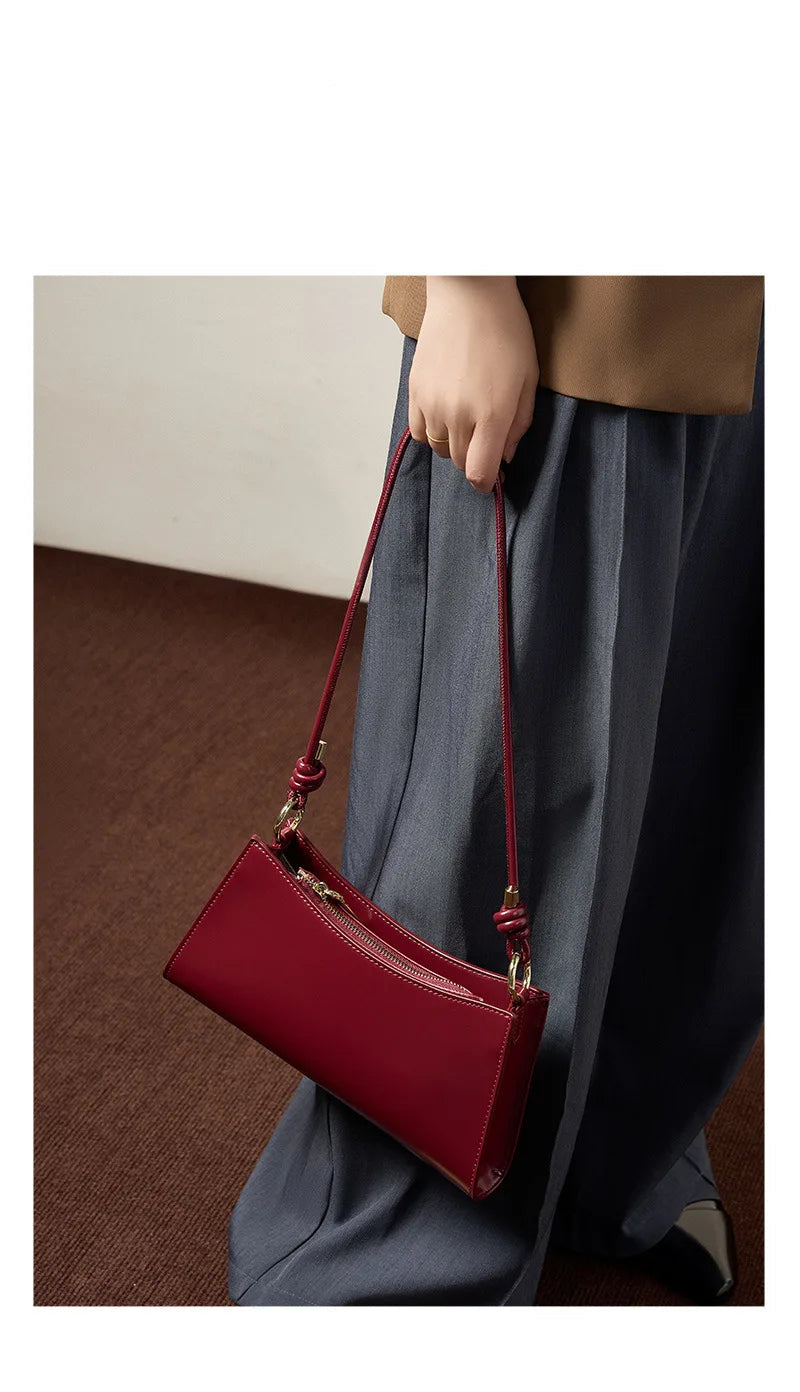 Genuine Leather Handbag with Knotted Strap and Gold Hardware
