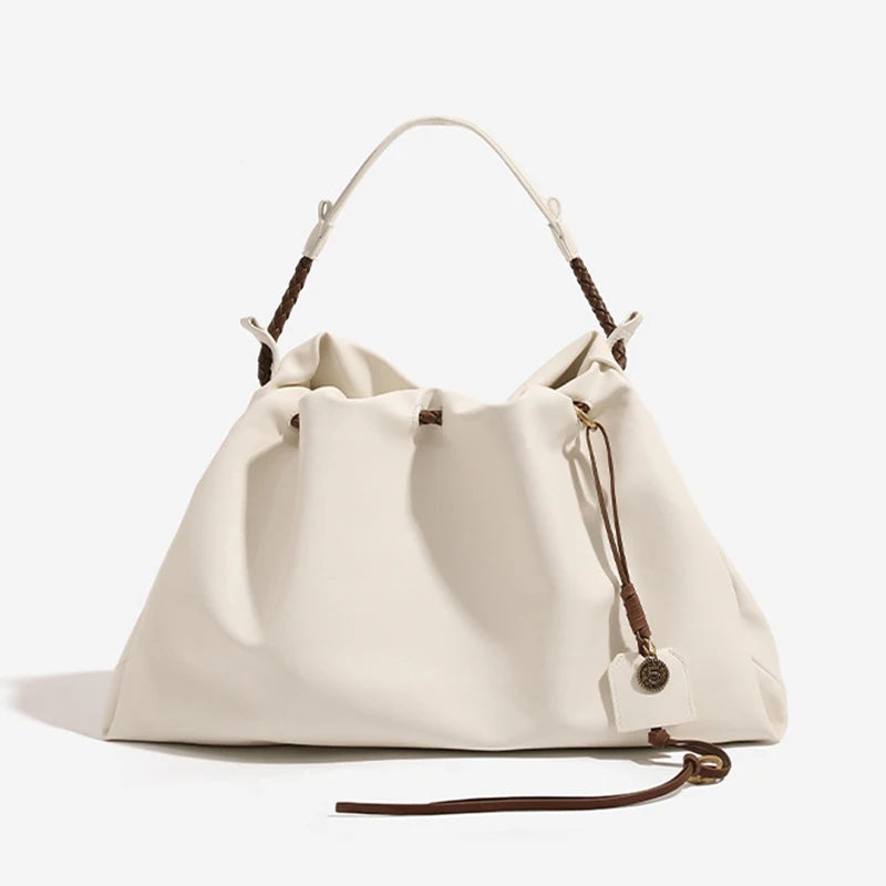 White Leather Bucket Bag with Braided Handle and Adjustable Strap