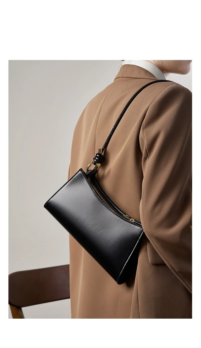 Genuine Leather Handbag with Knotted Strap and Gold Hardware