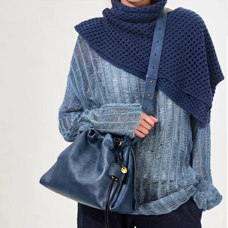 White Leather Bucket Bag with Braided Handle and Adjustable Strap