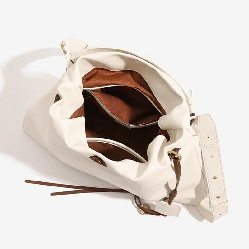 White Leather Bucket Bag with Braided Handle and Adjustable Strap