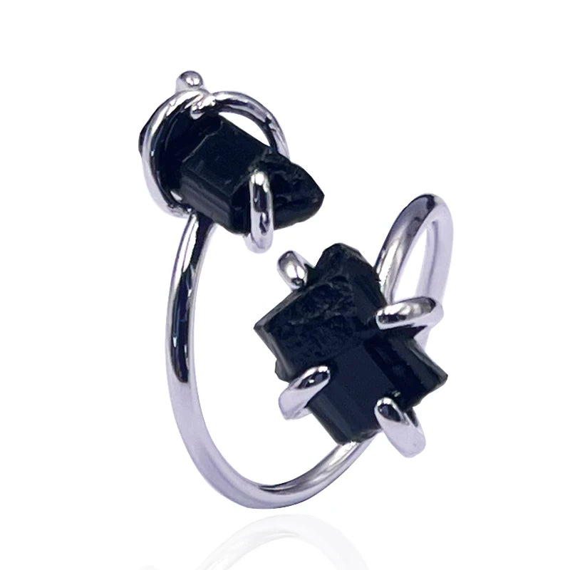 Black and silver hoop earrings on a white background
