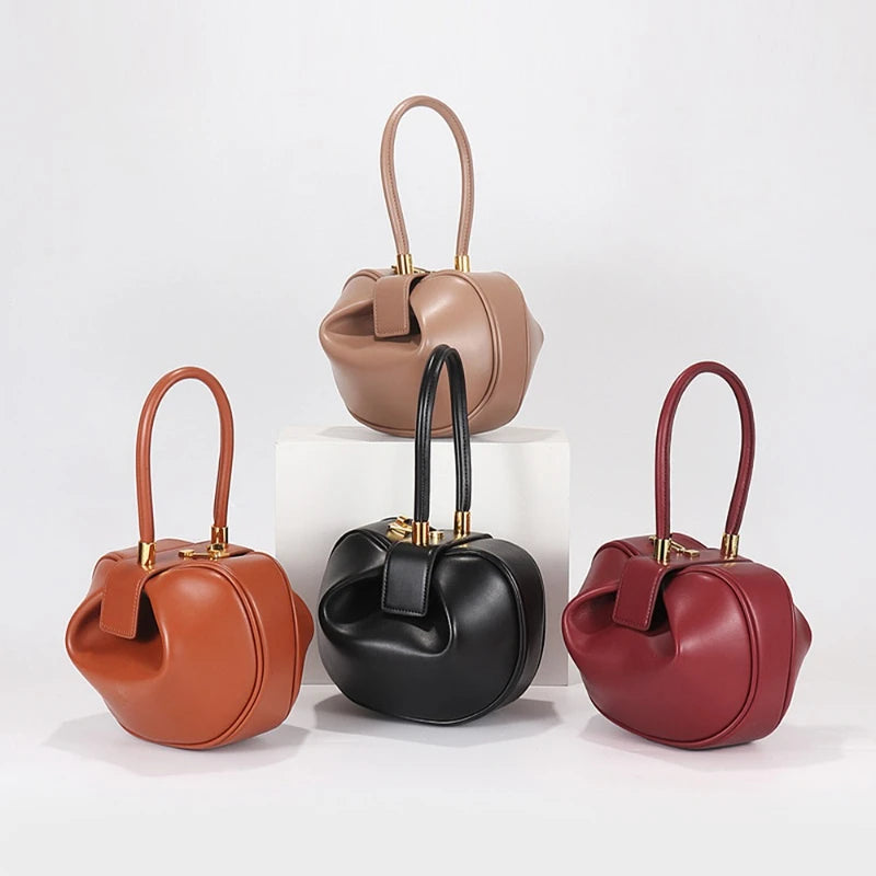 Genuine Leather Handbag with Gold Hardware and Top Handle
