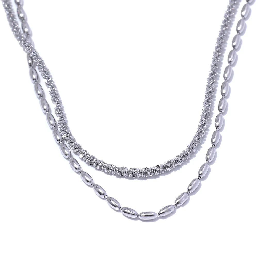 Two silver necklaces on a white background