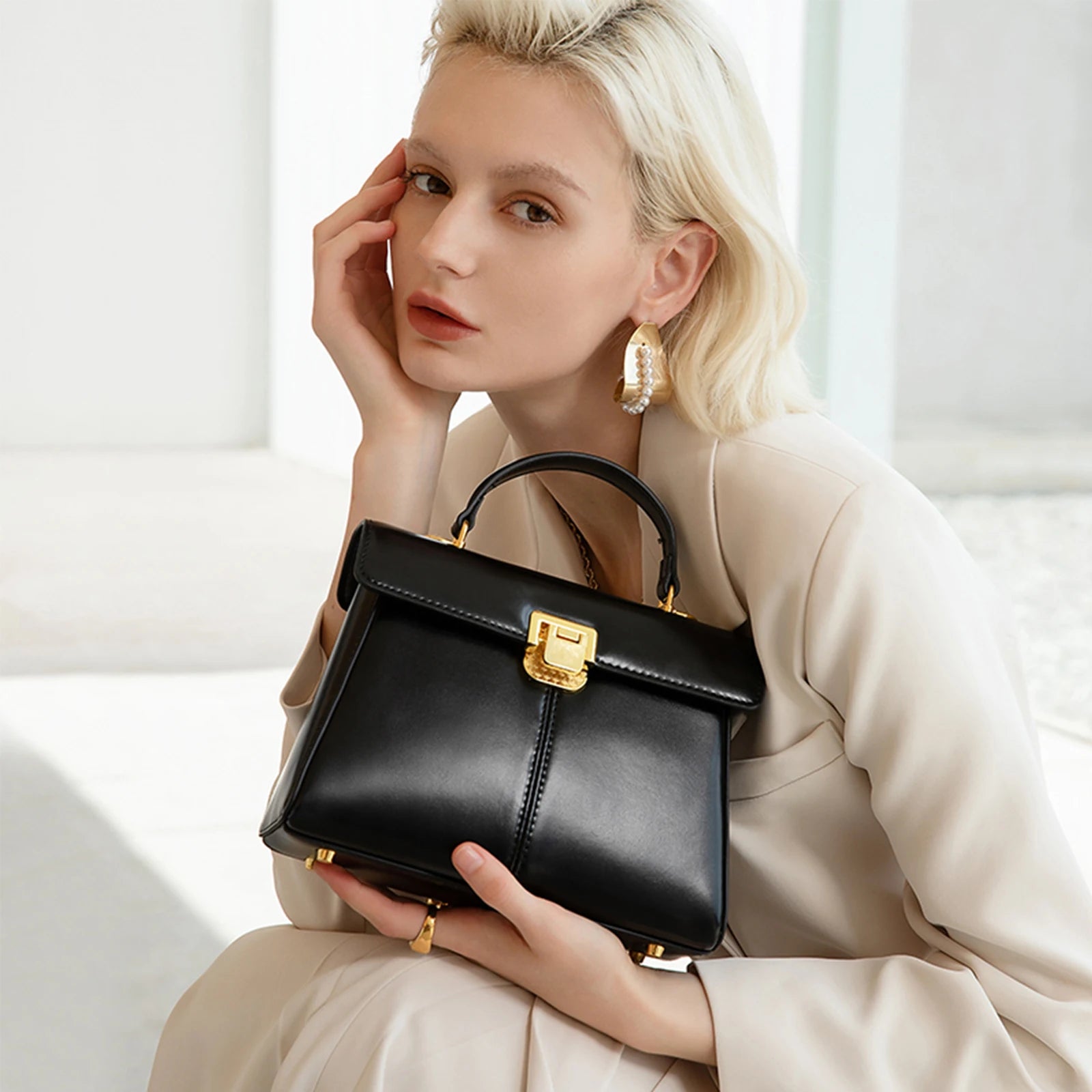 Genuine Leather Handbag with Gold Lock and Adjustable Strap