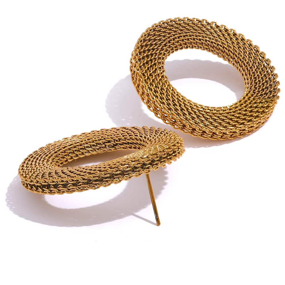 Two gold hoop earrings on a white background