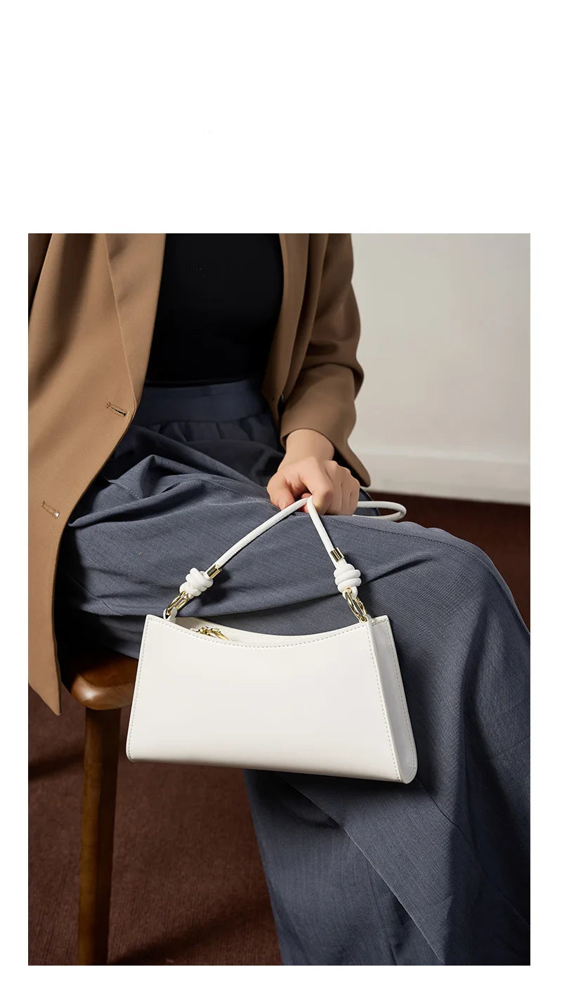 Genuine Leather Handbag with Knotted Strap and Gold Hardware